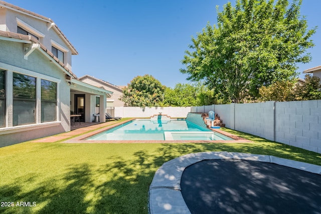 view of swimming pool featuring a patio area and a pool with connected hot tub