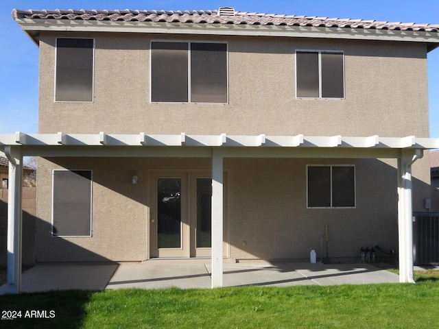 back of house featuring a patio area