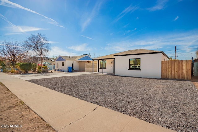 ranch-style house featuring a patio area