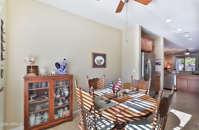 dining space with light tile patterned floors, visible vents, a ceiling fan, and recessed lighting