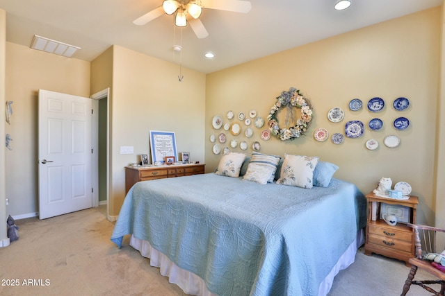 bedroom with recessed lighting, light colored carpet, a ceiling fan, baseboards, and visible vents