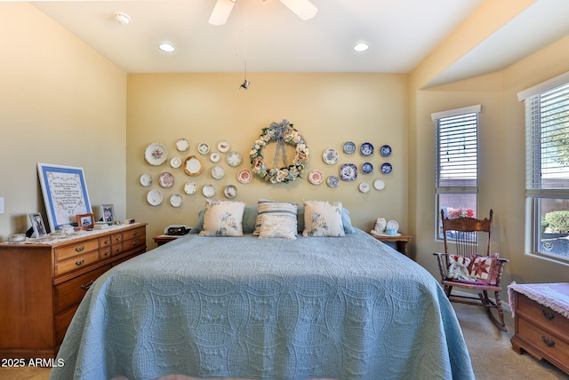 bedroom with recessed lighting, ceiling fan, and light colored carpet