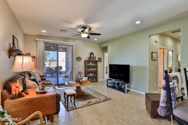 living room featuring recessed lighting, visible vents, and light tile patterned floors