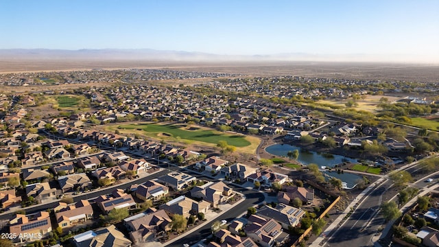 bird's eye view with a residential view and a water view