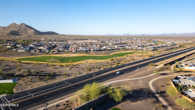 birds eye view of property featuring a mountain view, golf course view, and a residential view