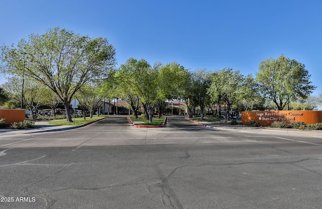 view of street featuring curbs and sidewalks