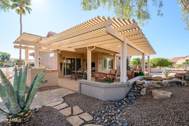 view of patio / terrace with an outdoor living space and a pergola