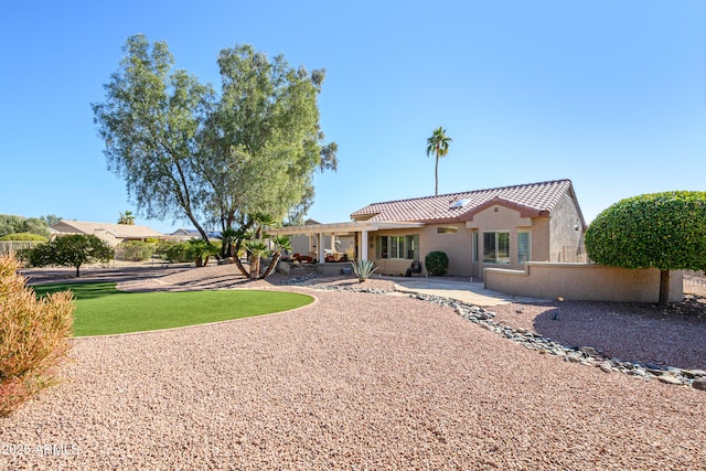 back of house with a patio area