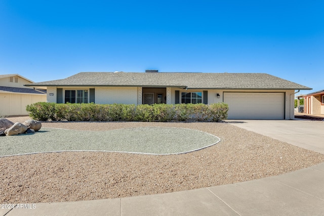 ranch-style home with a garage