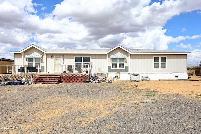 manufactured / mobile home featuring a wooden deck