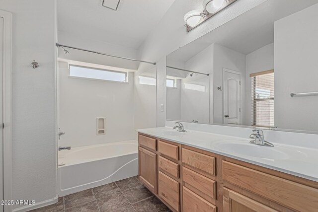 708 E Mule Train Trl, San Tan Valley, AZ 85143 - bathroom featuring double vanity, a sink, and shower / bathing tub combination