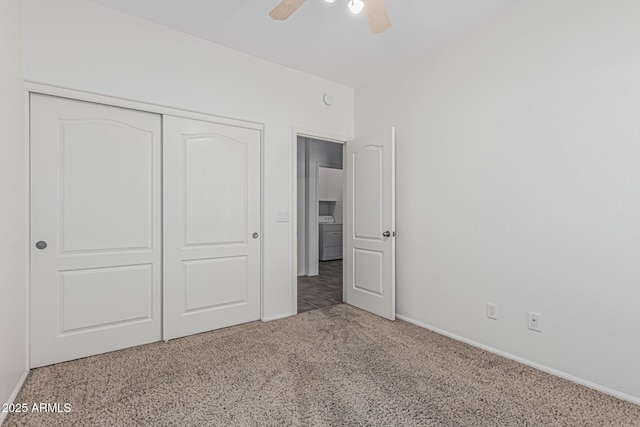 708 E Mule Train Trl, San Tan Valley, AZ 85143 - unfurnished bedroom featuring ceiling fan, washer / clothes dryer, baseboards, a closet, and carpet flooring