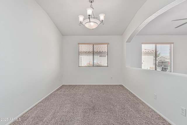 708 E Mule Train Trl, San Tan Valley, AZ 85143 - carpeted empty room with baseboards and ceiling fan with notable chandelier