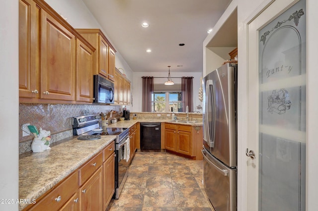 kitchen with black appliances, sink, decorative backsplash, decorative light fixtures, and light stone counters