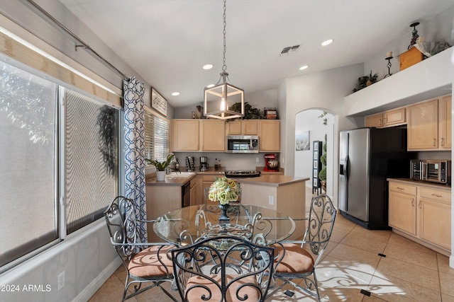 interior space featuring lofted ceiling and sink