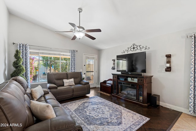 living room with ceiling fan, wood-type flooring, and lofted ceiling