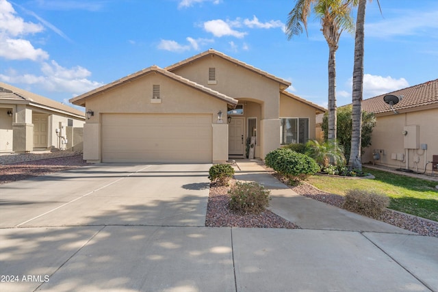 view of front of property featuring a garage