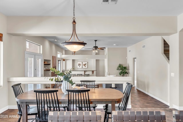 7524 E Leland Cir, Mesa, AZ 85207 - dining area featuring ceiling fan and baseboards