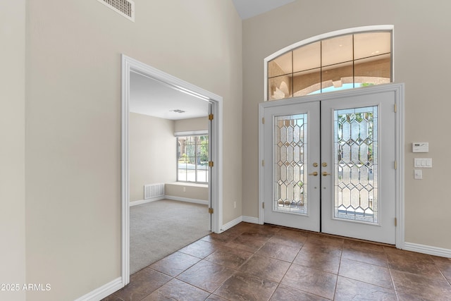 7524 E Leland Cir, Mesa, AZ 85207 - carpeted entryway with baseboards, french doors, and a high ceiling