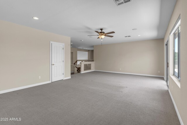 7524 E Leland Cir, Mesa, AZ 85207 - unfurnished living room featuring carpet, recessed lighting, a ceiling fan, and baseboards