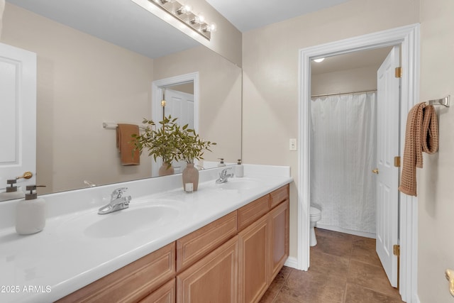 7524 E Leland Cir, Mesa, AZ 85207 - bathroom featuring toilet and double vanity