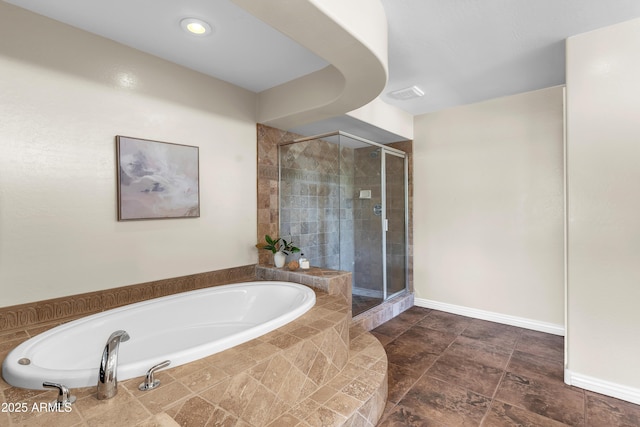 7524 E Leland Cir, Mesa, AZ 85207 - full bathroom featuring a shower stall, a bath, and baseboards