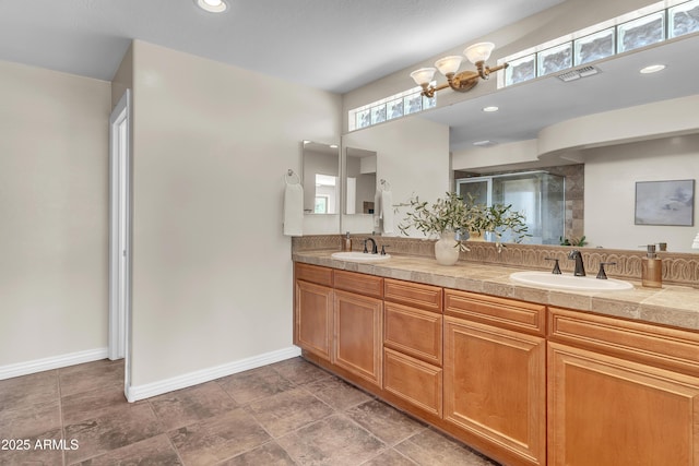 7524 E Leland Cir, Mesa, AZ 85207 - bathroom featuring a shower stall, double vanity, baseboards, a chandelier, and recessed lighting