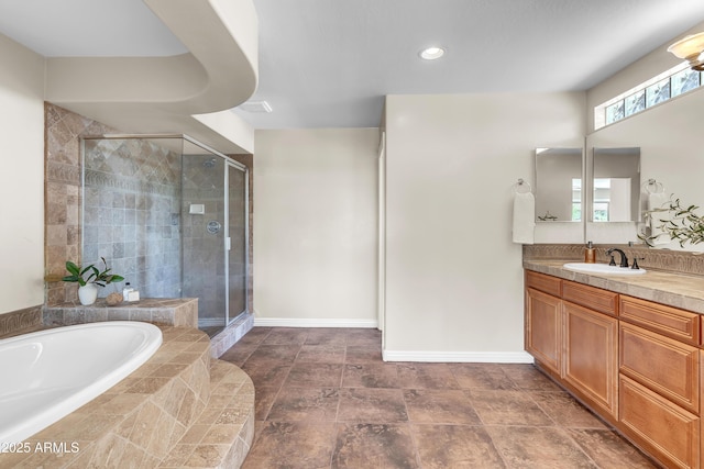7524 E Leland Cir, Mesa, AZ 85207 - full bath featuring a shower stall, a garden tub, vanity, recessed lighting, and baseboards