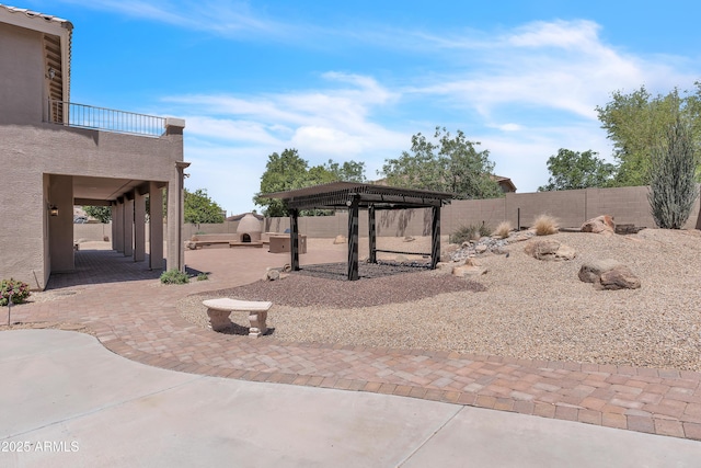 7524 E Leland Cir, Mesa, AZ 85207 - fenced backyard featuring a patio area and a balcony
