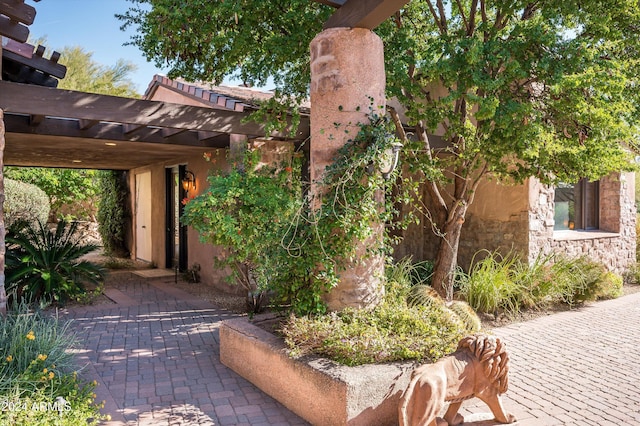 exterior space with a pergola