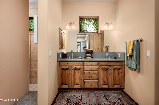 bathroom featuring vanity and walk in shower