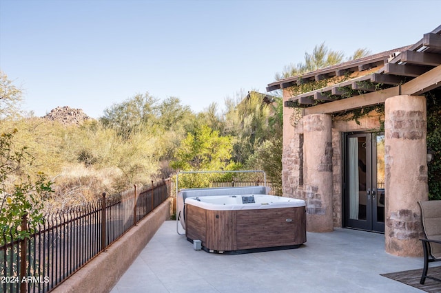 view of patio featuring a hot tub