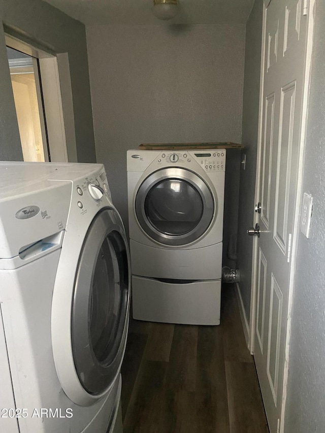 1217 E Hess Ave, Phoenix, AZ 85034 - washroom featuring separate washer and dryer and dark wood-type flooring