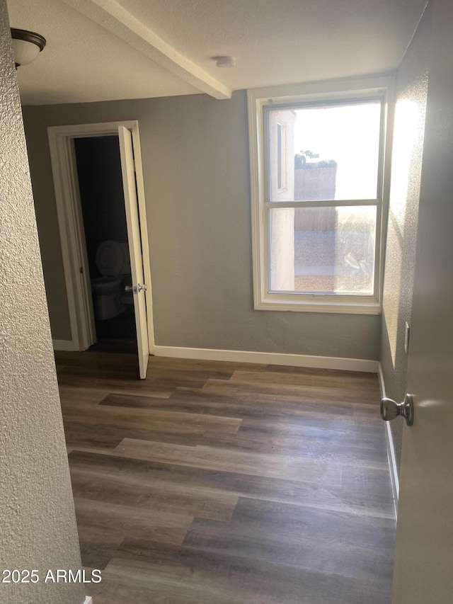 1217 E Hess Ave, Phoenix, AZ 85034 - empty room featuring dark wood-style floors