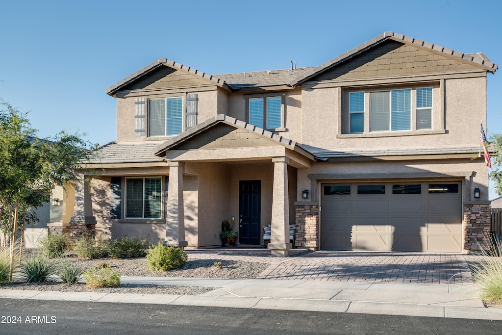 craftsman house featuring a garage