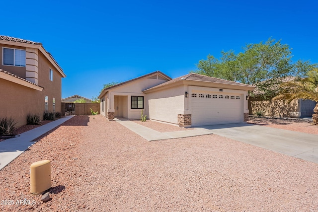 11805 W Sunnyside Dr, El Mirage, AZ 85335 - single story home featuring a garage, stucco siding, concrete driveway, and fence