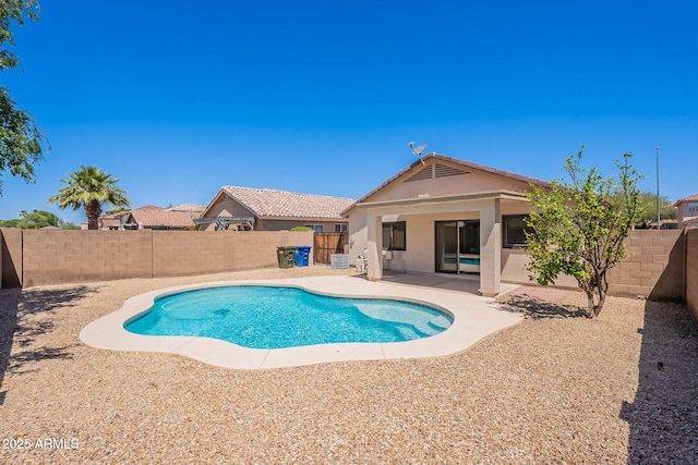 11805 W Sunnyside Dr, El Mirage, AZ 85335 - view of swimming pool featuring a fenced backyard and a patio