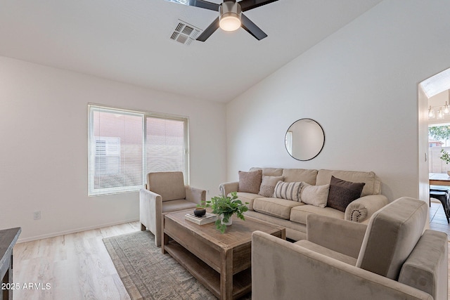 11805 W Sunnyside Dr, El Mirage, AZ 85335 - living area featuring a ceiling fan, lofted ceiling, light wood finished floors, and baseboards