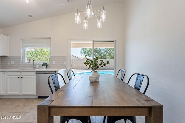 11805 W Sunnyside Dr, El Mirage, AZ 85335 - dining space featuring vaulted ceiling and light tile patterned flooring