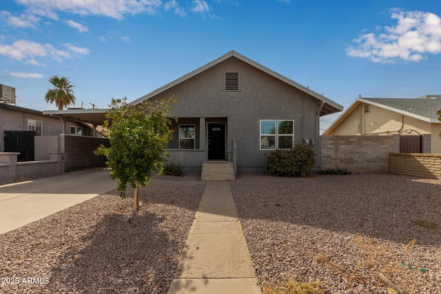 ranch-style home with a carport