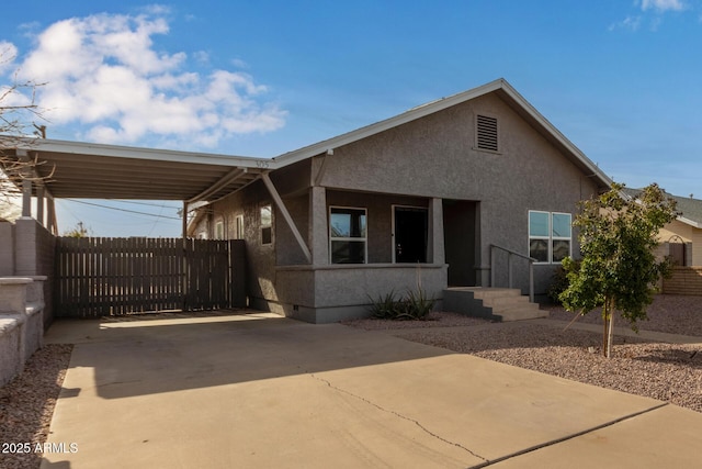 view of front of house featuring a carport