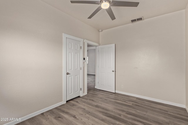 unfurnished bedroom with hardwood / wood-style flooring and ceiling fan