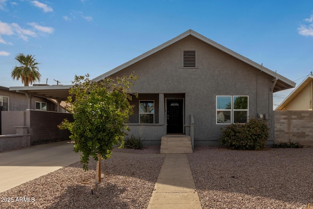 view of front of house featuring a carport