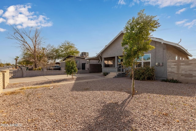 view of front of home featuring central AC