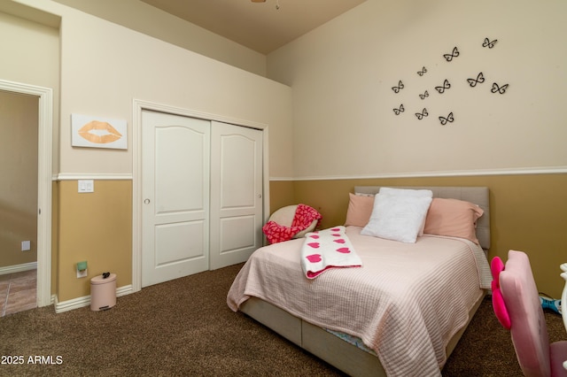 bedroom with carpet floors and a closet