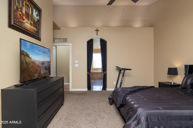 bedroom with light colored carpet and ceiling fan