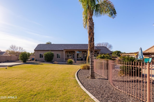 ranch-style house with a front yard and a pergola