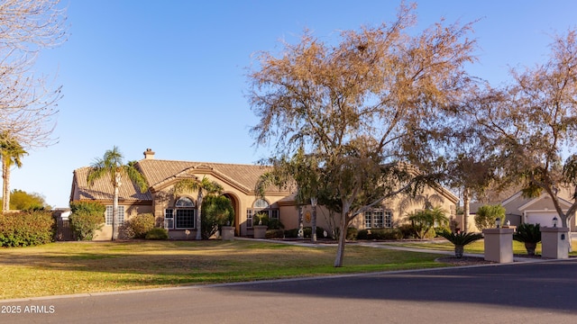 view of front facade featuring a front lawn