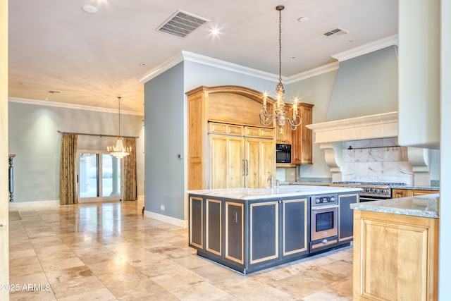 kitchen with a center island with sink, paneled fridge, hanging light fixtures, oven, and a chandelier