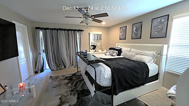 bedroom with carpet flooring and ceiling fan